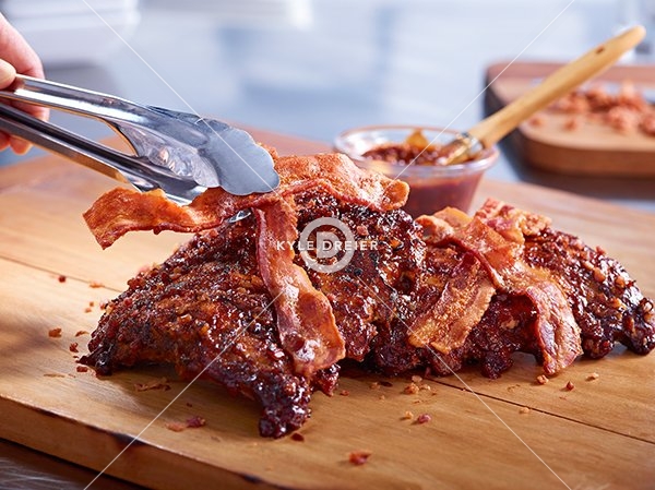 Bacon Ribs With Tongs