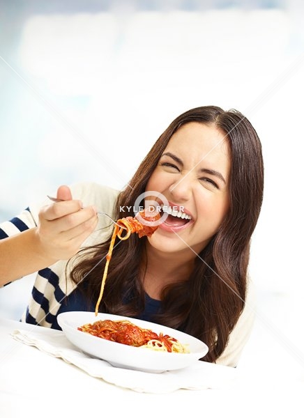 Female Eating Pasta