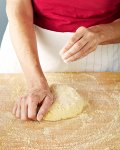 Sprinkling Flour onto Dough